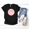Simply Sage Market Women's Pink Checker Smiley Face Short Sleeve Graphic Tee -Avenue Clothing Shop GUEST 6a24851a 84be 4553 b45f aff3b40d981a