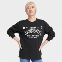 Hasbro Women's Halloween Ouija Board Graphic Sweatshirt - Black 8 Hasbro Women's Halloween Ouija Board Graphic Sweatshirt - Black -Avenue Clothing Shop GUEST dd68a13a ff55 4d69 b30a 02008207b76a